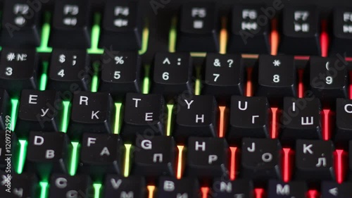 Colorful keyboard with illuminated keys in use