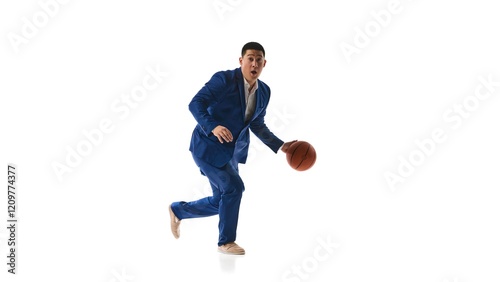 Man in blue suit running with basketball in active motion, reflecting drive and determination against white studio background. Concept of business agility, work-life balance, leadership, multitasking.