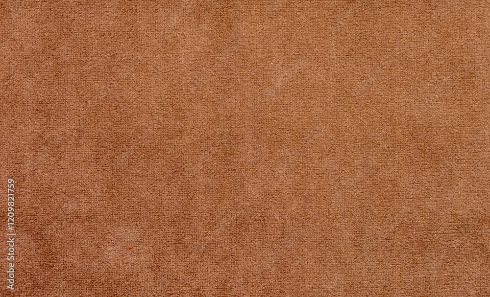 A brown carpet with a pattern of small squares A brown carpet with a pattern of small squares