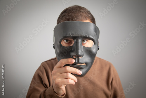 Caucasian man with a black mask. photo