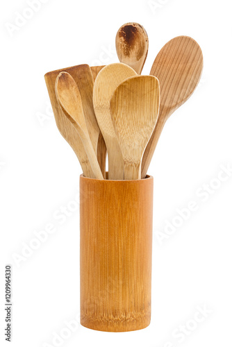 Wooden spoons and spatulas on white photo