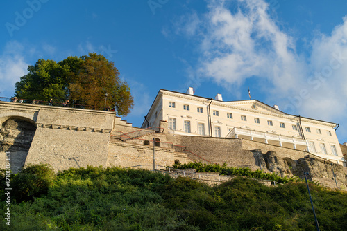 Iconic skyline view of Tallinn Old Town and Toompea hill on a sunny summer evening. Stenbock House, Patkuli viewing platform, defensive walls, rooftops. UNESCO World Heritage site, Estonia photo