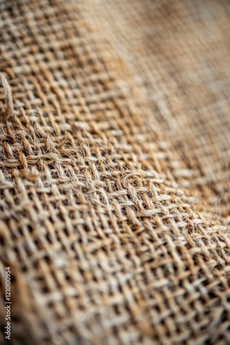 Detailed shot of a woven jute texture, ideal for eco-friendly and organic themes photo