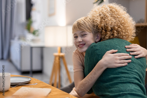 Happy Child Embracing Loving Parent in Cozy Home Setting