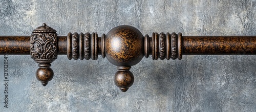 Elegant decorative curtain poles with intricate finials on a textured backdrop enhancing contemporary interior design aesthetics photo