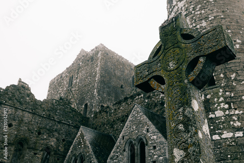 Celtic crosses at Rock of Cashel in Rainy foffy Irish Day , County Tipperary, Ireland photo