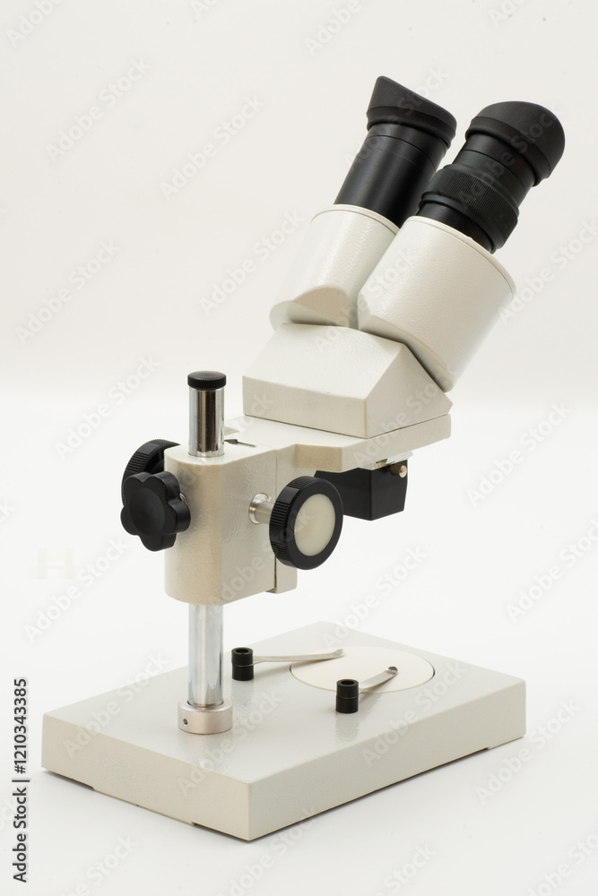Close-up of scientific microscope showcasing precision instruments for detailed observation in laboratory and QC inspection in process Close-up of scientific microscope showcasing precision instruments for detailed observation in laboratory and QC inspection in process