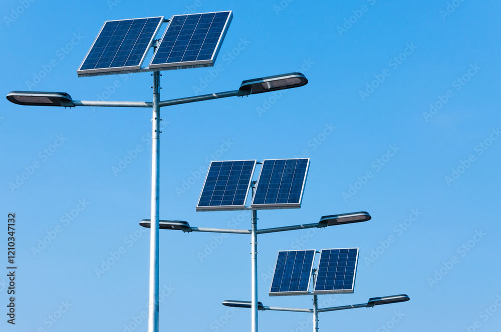 Obraz premium Solar panels installed on streetlights enhance energy efficiency in urban area