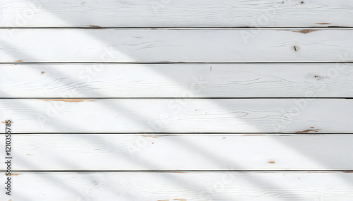 white wooden planks with natural shadow effect create a simplistic yet elegant pattern. The image evokes a sense of warmth and texture