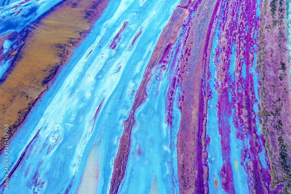 Abstract nature background. Top view of the bottom of a dry estuary. Colorful ground texture