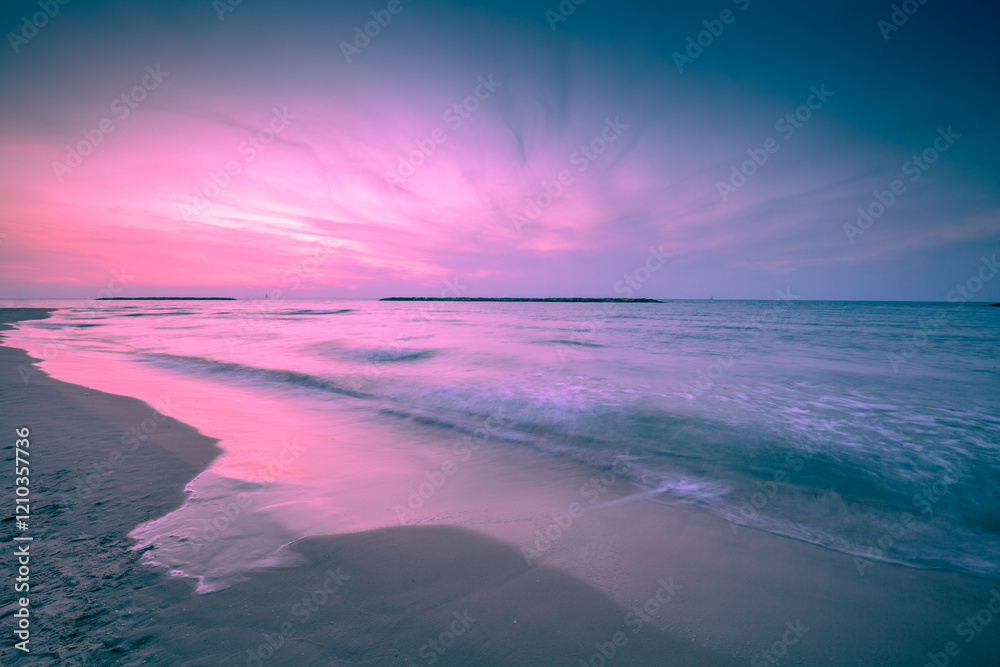 Seascape in the evening. Sunset over the sea with a beautiful dramatic glowing sky
