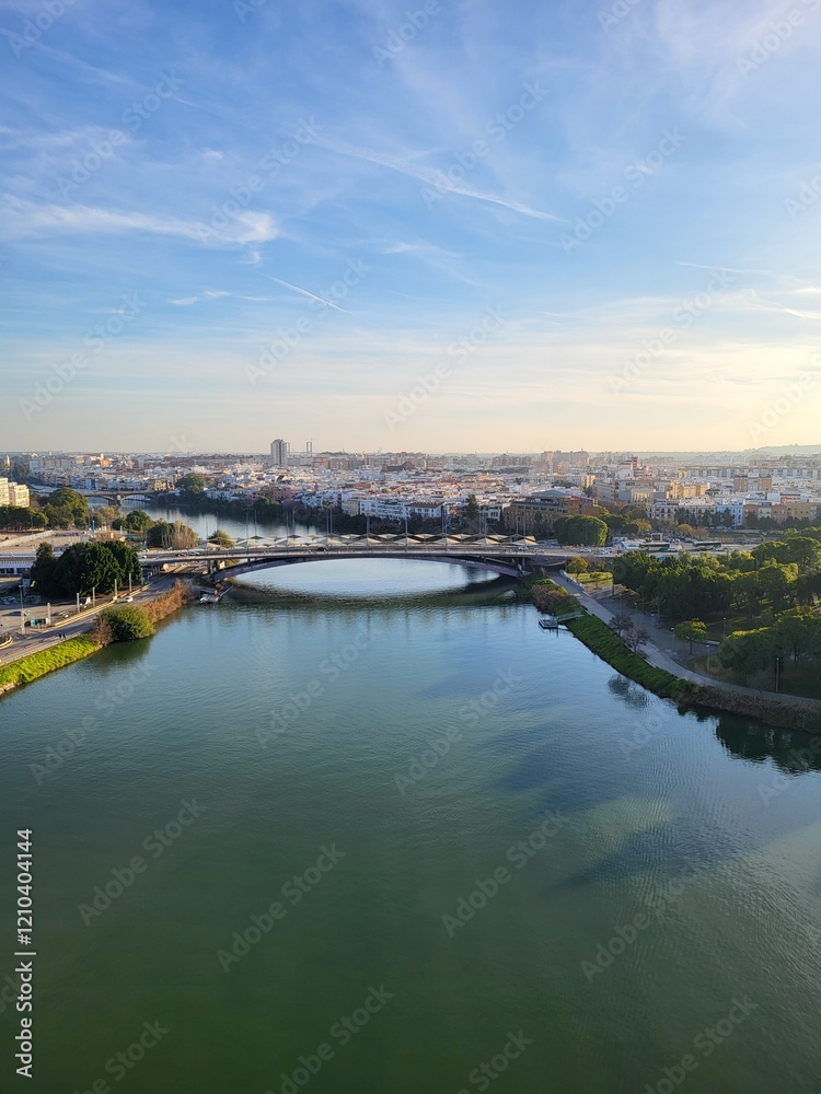 Obraz premium Bird view of Guadalquiver river and Sevilla city