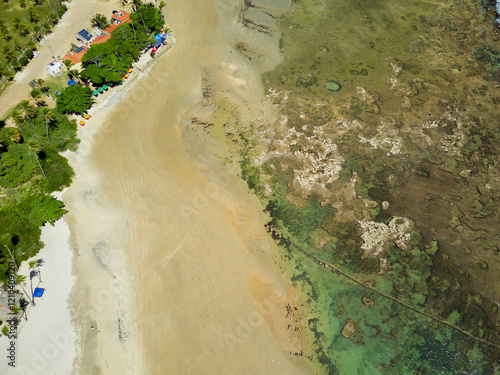 Reefs with natural pools in Paracuru beach, Ceara, Brazil. photo