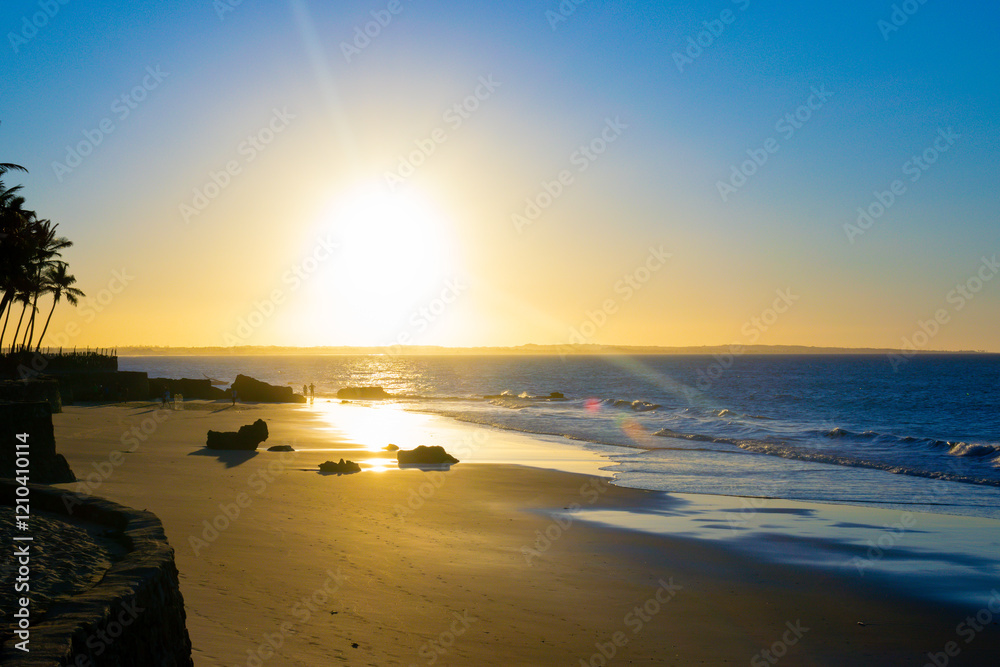 Naklejka premium Bright sunset in Paracuru beach, Ceara, Brazil.