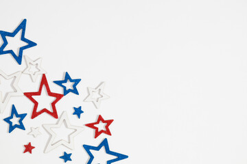 Border of confetti stars on white background. 4th of July, Happy Independence Day, President's Day, Labor Day. Flat lay, top view, copy space