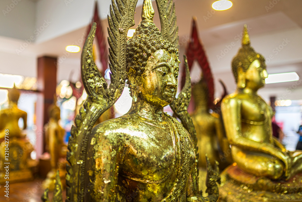 Old Beautiful Golden Buddha Many statues at Wat Phra Si Rattana Mahathat also colloquially referred to as Wat Yai is a Buddhist temple It is a major tourist is Public places in Phitsanulok,Thailand.