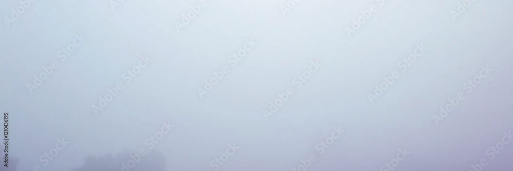 A foggy spring morning envelops the city, blurring the outlines of buildings. The soft, muted colors create a serene and peaceful atmosphere for the day ahead