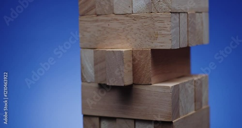 Tension in Jenga A CloseUp View of a Tower Made of Wooden Blocks Standing Tall and Steady