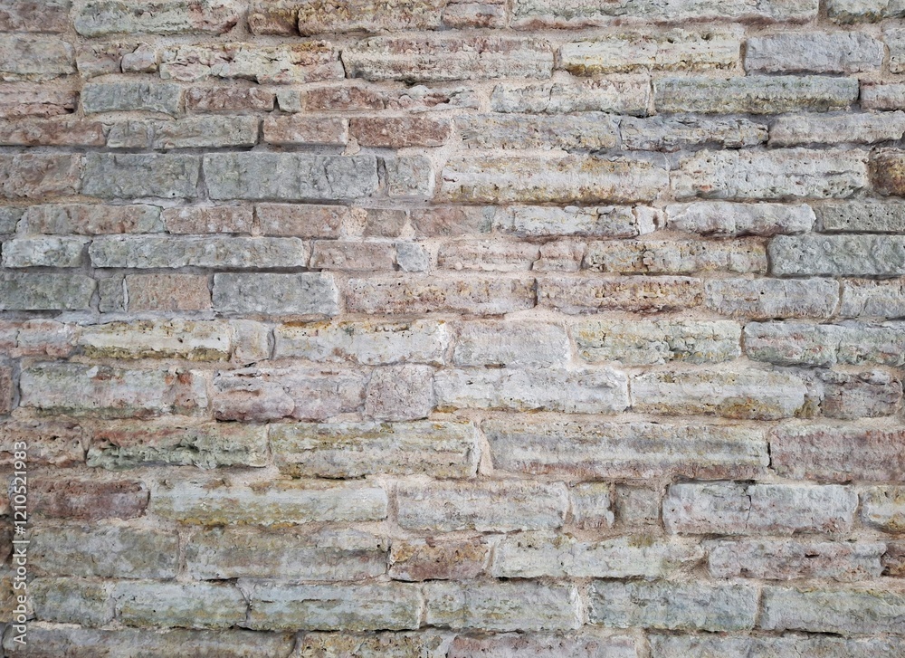 An old brick wall. Texture of light colored brickwork. An old brick wall. Texture of light colored brickwork.