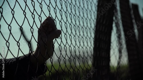 marginalization, immigration barriers. woman hands seeking freedom and life