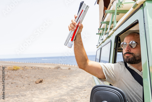 Blind man enjoying a scenic trip in a motorhome adventure photo