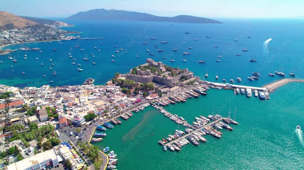 Bodrum District of Mugla, Turkey. Aerial view of Bodrum Castle. Panoramic view of Bodrum center, marina and castle. Drone shot.