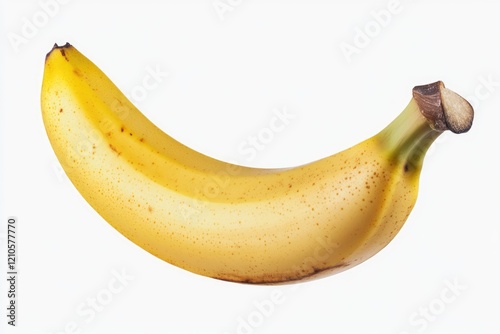 A ripe banana with brown spots, indicating a higher sugar content and a sweeter taste.