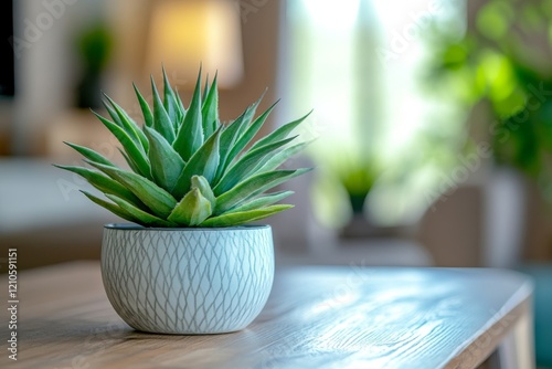 Bright rays illuminate a potted plant on a wooden table against a softly lit ...