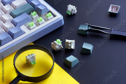 Replacing keycaps and switches of a mechanical computer keyboard. Repair, customization and upgrade of gaming devices. Photo. Selective focus photo