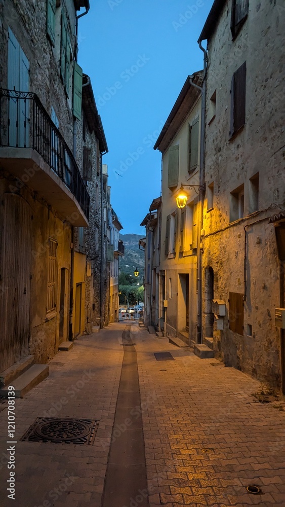 Fototapeta premium A street in a small town in the south of France at night street in the town.