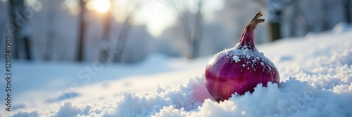 Frost-covered onion on a snowy hillside with bare trees, frozen, frostbite