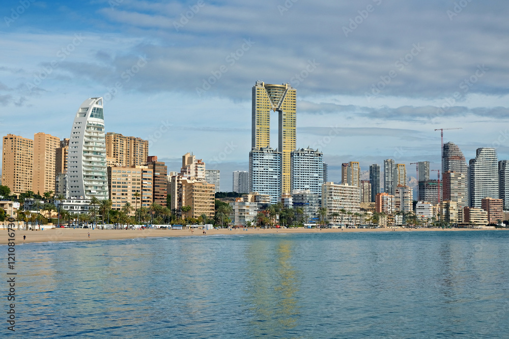 Beautiful view to Mediterranean Sea and Benidorm resort city and Poniente beach. Benidorm is a popular coastal resort town in Alicante province, Spain Beautiful view to Mediterranean Sea and Benidorm resort city and Poniente beach. Benidorm is a popular coastal resort town in Alicante province, Spain