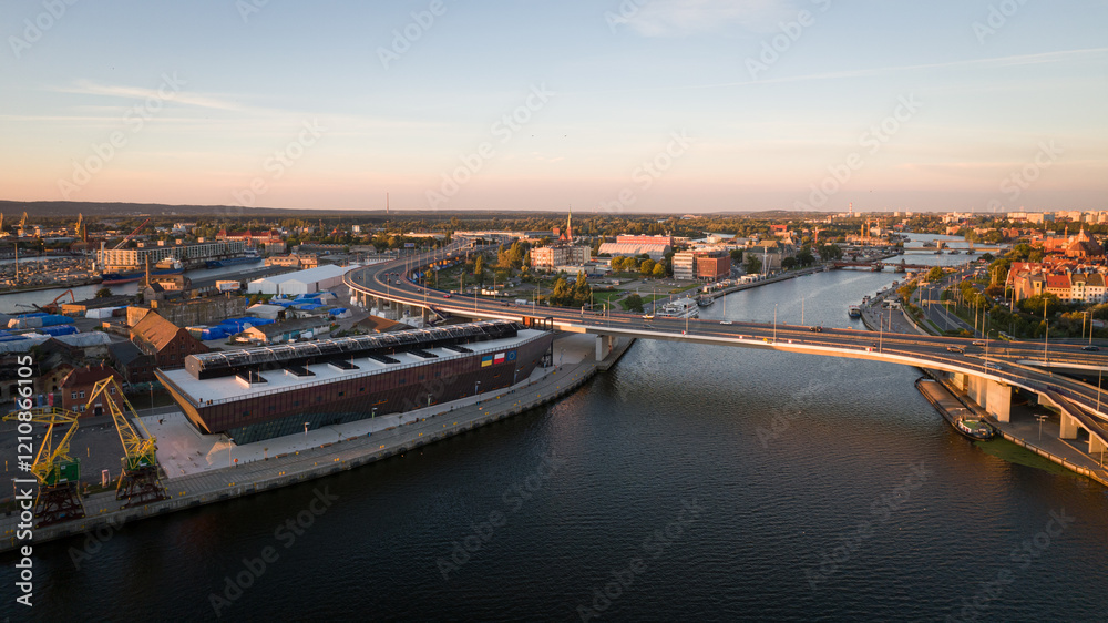 Obraz premium Aerial View of Szczecin, Poland with Bridges and Harbor at Sunset