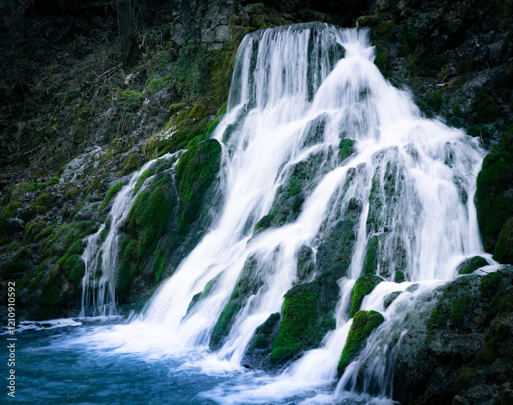 Fototapeta premium waterfall high in the mountains