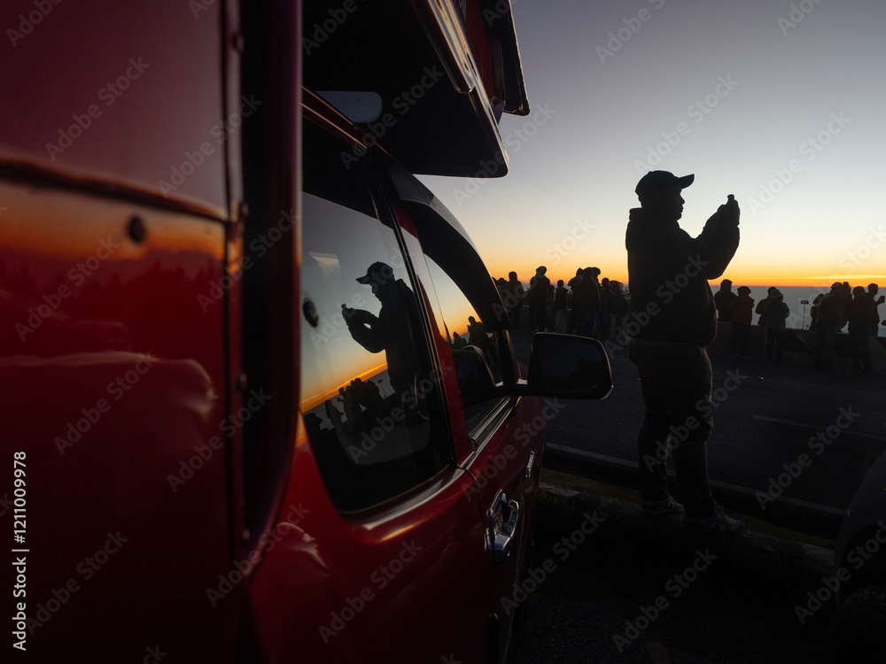 Silhouette of many people and the morning light on the top of Doi Inthanon in Chiang Mai, Thailand.
