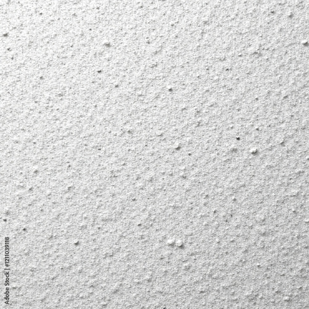 Obraz premium Close-up of textured white wall with dotted surface, ideal for backgrounds and designs.