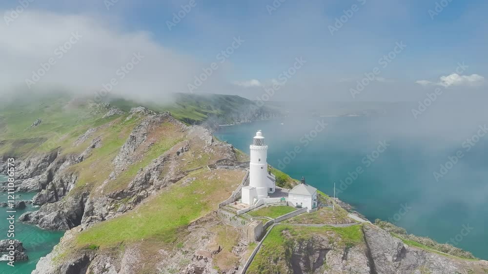 Start Point Cliffs Sea Fret over Start Point Lighthouse and Cliffs from a drone, Trinity ...