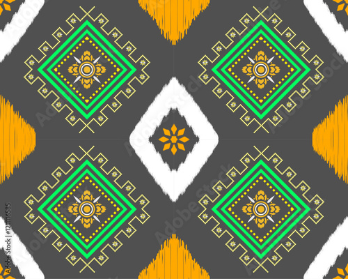Colorful geometric pattern with diamonds and floral motifs on gray background, featuring vibrant orange, green, and white elements