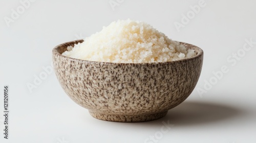 Bowl of uncooked couscous. photo