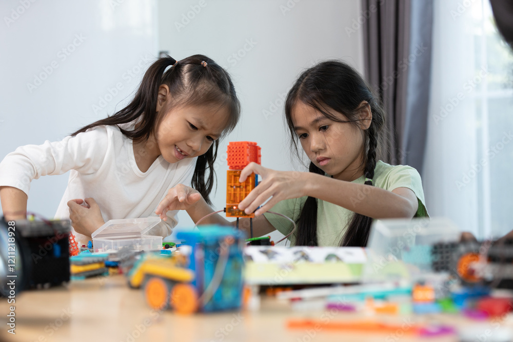 Education STEM children student in classroom. Robot assembly training, brain development, Learning electrical future engineering. Education STEM children student in classroom. Robot assembly training, brain development, Learning electrical future engineering.