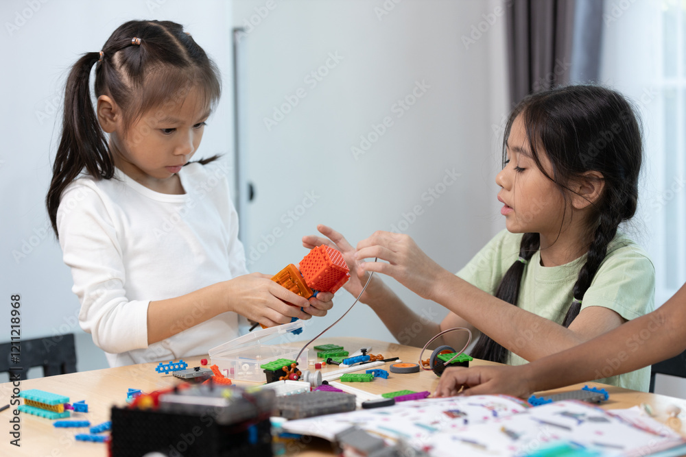Education STEM children student in classroom. Robot assembly training, brain development, Learning electrical future engineering. Education STEM children student in classroom. Robot assembly training, brain development, Learning electrical future engineering.