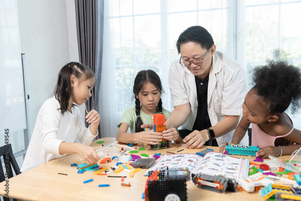 Education STEM children student classroom in school. Robot assembly training, brain development, Kid learning electrical future engineering. Education STEM children student classroom in school. Robot assembly training, brain development, Kid learning electrical future engineering.