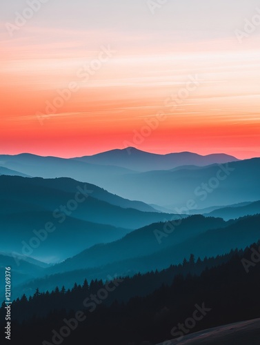 Dusk sky over blue mountains with tree silhouettes, red and orange sunset, minimal nature