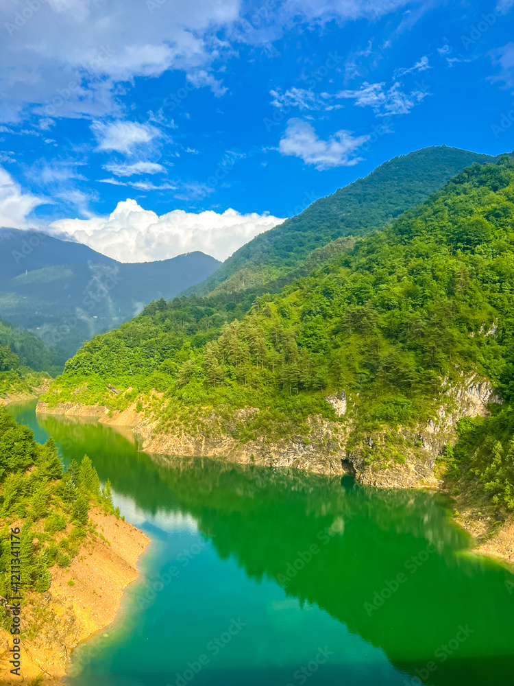 Valvestino lake from Recchi bridge on summer day, Italy Valvestino lake from Recchi bridge on summer day, Italy