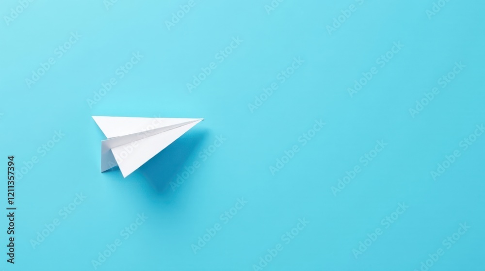 A Simple White Paper Airplane Soaring Across a Vibrant Blue Background, Symbolizing Dreams of Flight and Journeys to New Horizons A Simple White Paper Airplane Soaring Across a Vibrant Blue Background, Symbolizing Dreams of Flight and Journeys to New Horizons