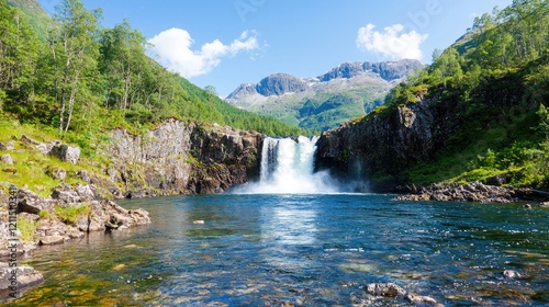 Majestic waterfall cascading into a serene pool, surrounded by lush green mountains under a bright sky; ideal for travel brochures