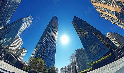 The fa ç ade of modern skyscrapers and glass curtain wall buildings in the city photo