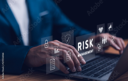 Risk management strategy concept. A businessman use laptop analyzing, a risk management interface with critical strategy. Risky business risk management control and strategy. Stability unforeseen.