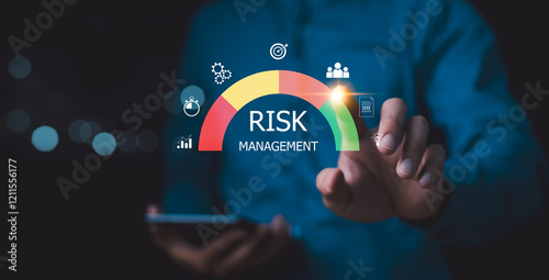 Obraz na płótnie Risk management strategy concept. Businessman Analyzing Risk touchscreen display risk meter, risk management interface with critical strategy. Risky business risk management control and strategy. w salonie