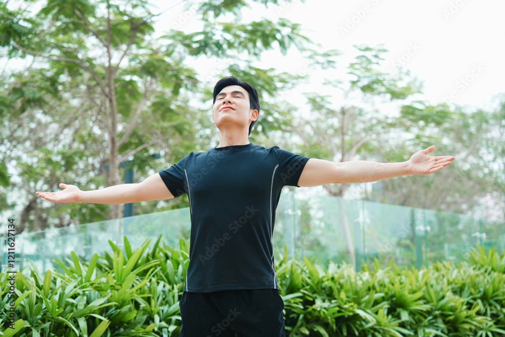 Portrait of young Asian man exercising outside Portrait of young Asian man exercising outside